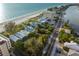 Aerial view of beachfront property, showing homes and ocean at 20051 Gulf Blvd, Indian Shores, FL 33785