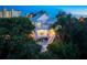 Two-story home with private balcony, offering serene waterfront views at 20051 Gulf Blvd, Indian Shores, FL 33785