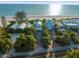 Aerial image showcasing beachfront homes and ocean views at 20051 Gulf Blvd, Indian Shores, FL 33785