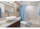 Clean bathroom with tub and modern vessel sink at 5817 Park N St # 402, St Petersburg, FL 33709