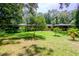 Ranch style home nestled amongst lush landscaping at 15350 Scanio Dr, Spring Hill, FL 34610