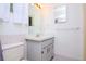 Simple bathroom with vanity, toilet, and a mirrored medicine cabinet at 15350 Scanio Dr, Spring Hill, FL 34610