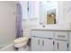 Clean bathroom with shower, vanity, and updated fixtures at 15350 Scanio Dr, Spring Hill, FL 34610