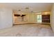 Open living room with high ceilings and wood beams at 15350 Scanio Dr, Spring Hill, FL 34610