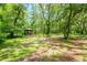 Wooden gazebo with table, benches and ceiling fan at 15350 Scanio Dr, Spring Hill, FL 34610