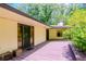 Spacious back deck with access from multiple rooms, overlooks a lush garden at 15350 Scanio Dr, Spring Hill, FL 34610