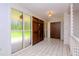 Spacious entryway with tiled floors and double doors at 15350 Scanio Dr, Spring Hill, FL 34610