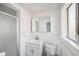 Clean bathroom with white vanity, shower and toilet at 1549 Linwood Dr, Clearwater, FL 33755