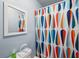 Bathroom with a shower featuring a patterned curtain at 1549 Linwood Dr, Clearwater, FL 33755