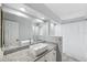 Bathroom with a granite vanity, a vessel sink, and a shower-tub combo at 1549 Linwood Dr, Clearwater, FL 33755