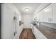 Bright kitchen features white cabinets, granite countertops, and modern appliances at 1549 Linwood Dr, Clearwater, FL 33755