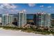 Aerial view of beachfront high-rise buildings at 1560 Gulf Blvd # 1004, Clearwater Beach, FL 33767