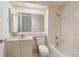 Bathroom featuring single vanity, toilet, and bathtub/shower combination at 1560 Gulf Blvd # 1004, Clearwater Beach, FL 33767
