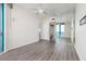 Empty bedroom with mirrored wall, gray wood-look floors, and ocean views at 1560 Gulf Blvd # 1004, Clearwater Beach, FL 33767
