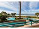 Resort-style pool with beach views and lounge chairs at 1560 Gulf Blvd # 1004, Clearwater Beach, FL 33767