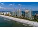 Luxury condos on the beach with beautiful landscaping, a sparkling pool, and sweeping ocean views at 1560 Gulf Blvd # 1004, Clearwater Beach, FL 33767