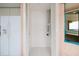 In-unit laundry room with shelving and storage at 1560 Gulf Blvd # 1004, Clearwater Beach, FL 33767
