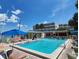 Inviting community pool with lounge chairs and bar at 2506 N Rocky Point Dr # 356, Tampa, FL 33607