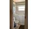 Walk in bathtub and toilet in a retro bathroom at 385 Dolphin Se Ave, St Petersburg, FL 33705
