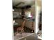 Galley kitchen with appliances and ample counter space at 385 Dolphin Se Ave, St Petersburg, FL 33705
