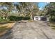 Spacious two-car garage with a basketball hoop at 10208 Grove Dr, Port Richey, FL 34668