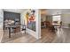 Home office with chalkboard wall and view into dining area at 10208 Grove Dr, Port Richey, FL 34668