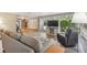 Spacious living room with hardwood floors and lots of natural light at 10208 Grove Dr, Port Richey, FL 34668