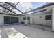 Screened-in pool area with a patio and storage at 10208 Grove Dr, Port Richey, FL 34668