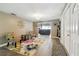 Light and airy entryway with hardwood floors at 10208 Grove Dr, Port Richey, FL 34668