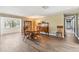 Classic dining room with hardwood floors and antique furniture at 10208 Grove Dr, Port Richey, FL 34668