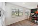Home office with large window and wood-look floors at 10208 Grove Dr, Port Richey, FL 34668
