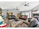 Bright and airy living room with vaulted ceiling and access to the pool at 10208 Grove Dr, Port Richey, FL 34668