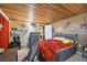 Bright bedroom featuring a comfortable bed and ample storage at 10208 Grove Dr, Port Richey, FL 34668