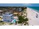 Modern beachfront home with a private pool, offering luxury coastal living at 2 4Th Ave, Indian Rocks Beach, FL 33785