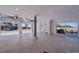 Spacious garage with access to pool area, sliding door, and motorized garage doors at 2 4Th Ave, Indian Rocks Beach, FL 33785