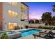 Backyard pool featuring a modern design with an integrated spa and ample lounging space at 2 4Th Ave, Indian Rocks Beach, FL 33785