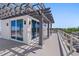 A rooftop deck with a pergola featuring ocean views and neighborhood views at 2 4Th Ave, Indian Rocks Beach, FL 33785
