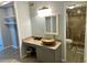 Inviting bathroom with granite-look counter, vessel sink, and walk-in shower with tile surround at 7200 Sunshine Skyway S Ln # 7E, St Petersburg, FL 33711