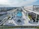 Relaxing rooftop pool and lounge area with fire pit at 777 3Rd N Ave # 1204, St Petersburg, FL 33701