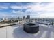 Relaxing rooftop terrace with fire pit and city views at 777 3Rd N Ave # 1204, St Petersburg, FL 33701