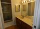 Bathroom with double vanity and walk-in shower at 201 Cypress Pond Rd # 201, Palm Harbor, FL 34683
