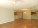 Spacious living room with laminate wood floors at 201 Cypress Pond Rd # 201, Palm Harbor, FL 34683
