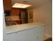 Kitchen with breakfast bar and stainless steel appliances at 201 Cypress Pond Rd # 201, Palm Harbor, FL 34683