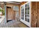 Outdoor bar area with wooden walls and a covered deck, featuring an exterior shower at 4822 3Rd S Ave, St Petersburg, FL 33711