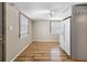 Eat-in kitchen with wood-look floors and white cabinets at 4822 3Rd S Ave, St Petersburg, FL 33711