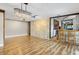 Open dining area with stone accent wall and kitchen bar at 4822 3Rd S Ave, St Petersburg, FL 33711