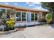Front entrance of a charming updated home with landscaping at 4822 3Rd S Ave, St Petersburg, FL 33711