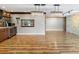 Open dining area with hardwood floors and modern chandelier at 4822 3Rd S Ave, St Petersburg, FL 33711