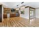 Game room features hardwood floors, chandelier lighting, and a wet bar at 4822 3Rd S Ave, St Petersburg, FL 33711