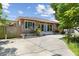 Updated home with wood siding and a large front yard at 4822 3Rd S Ave, St Petersburg, FL 33711